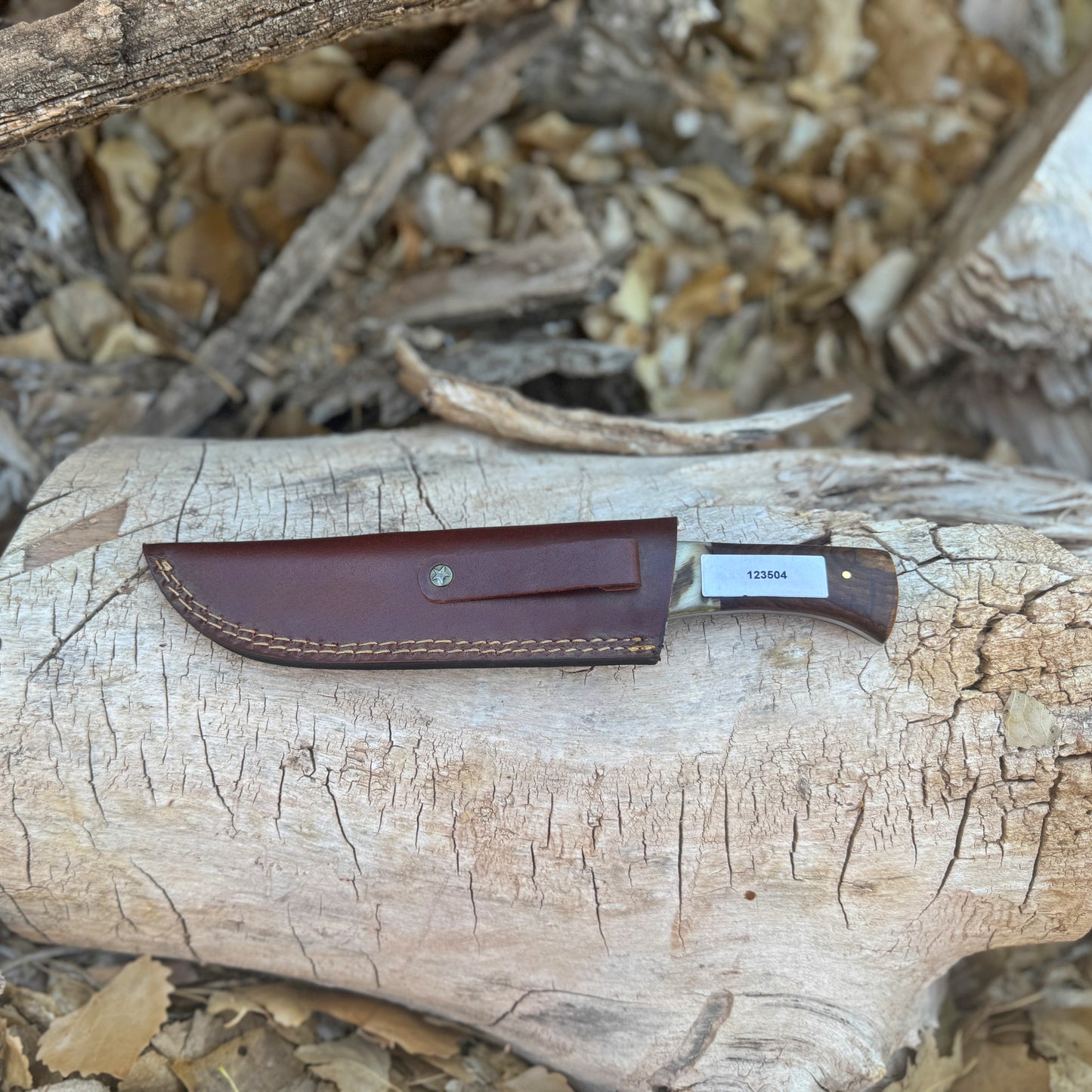 The Nomad Hand-Forged Damascus Camp Knife with Horn & Hardwood Handle