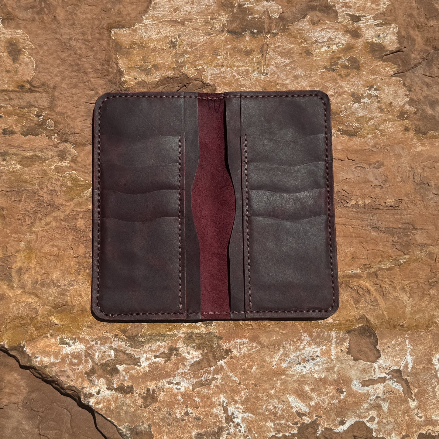 The Frontier Ledger Hand-Stitched Full-Grain Leather Bifold Wallet in Rich Mahogany