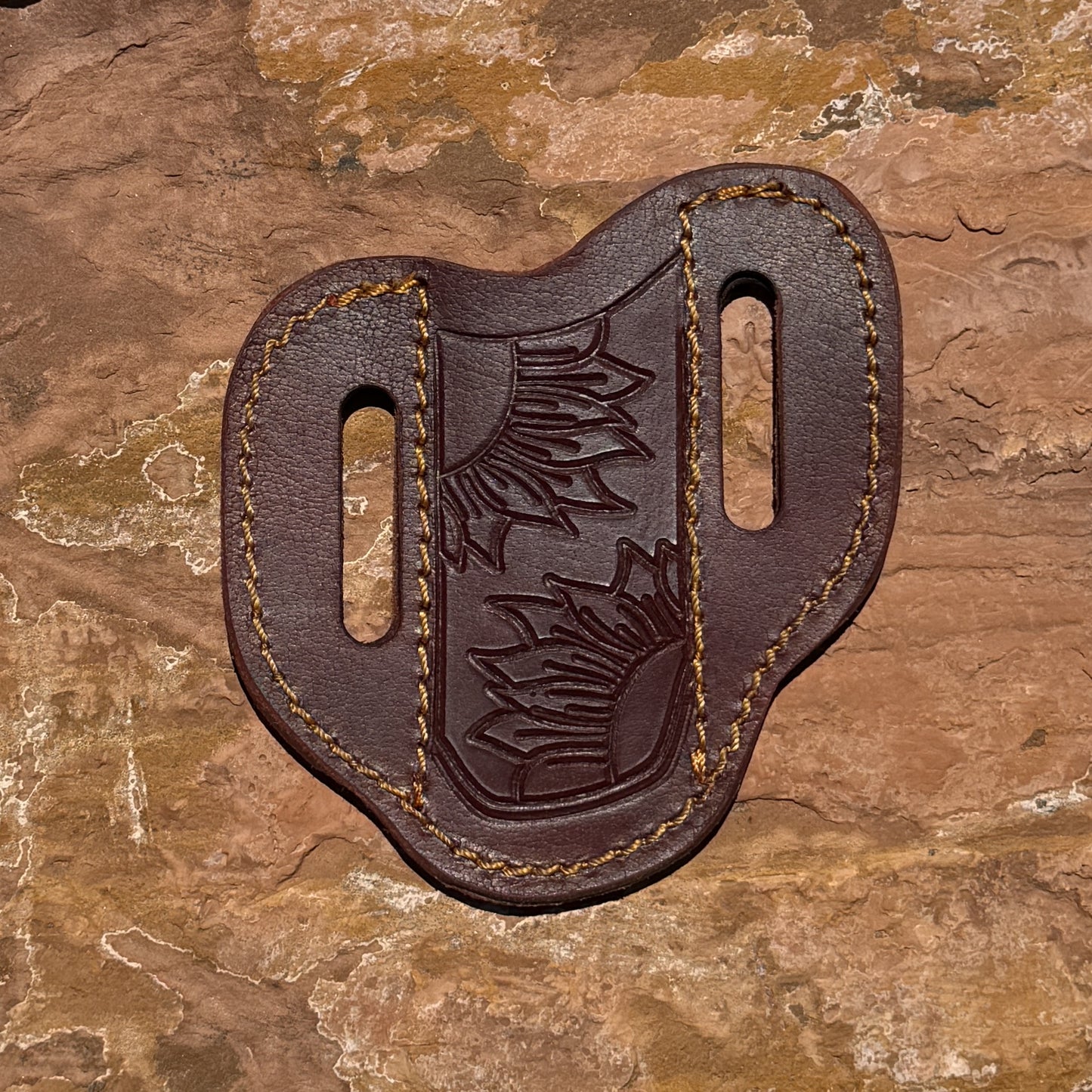 Blue Spade Forge medium brown leather pancake knife sheath with hand-tooled design and heavy-duty stitching for fixed blade hunting, bushcraft, and everyday carry knives.