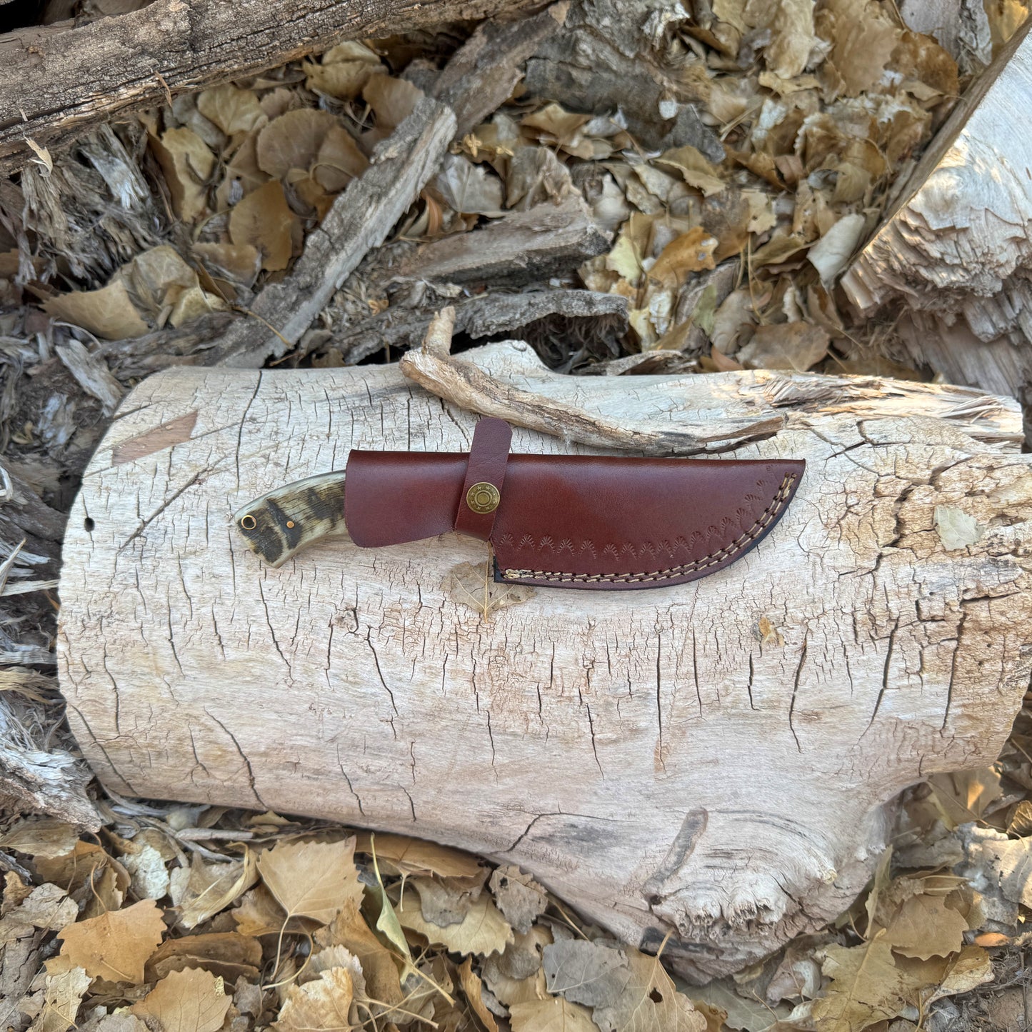 The Outlander Hand-Forged Damascus Tracker with Horn & Hardwood Handle