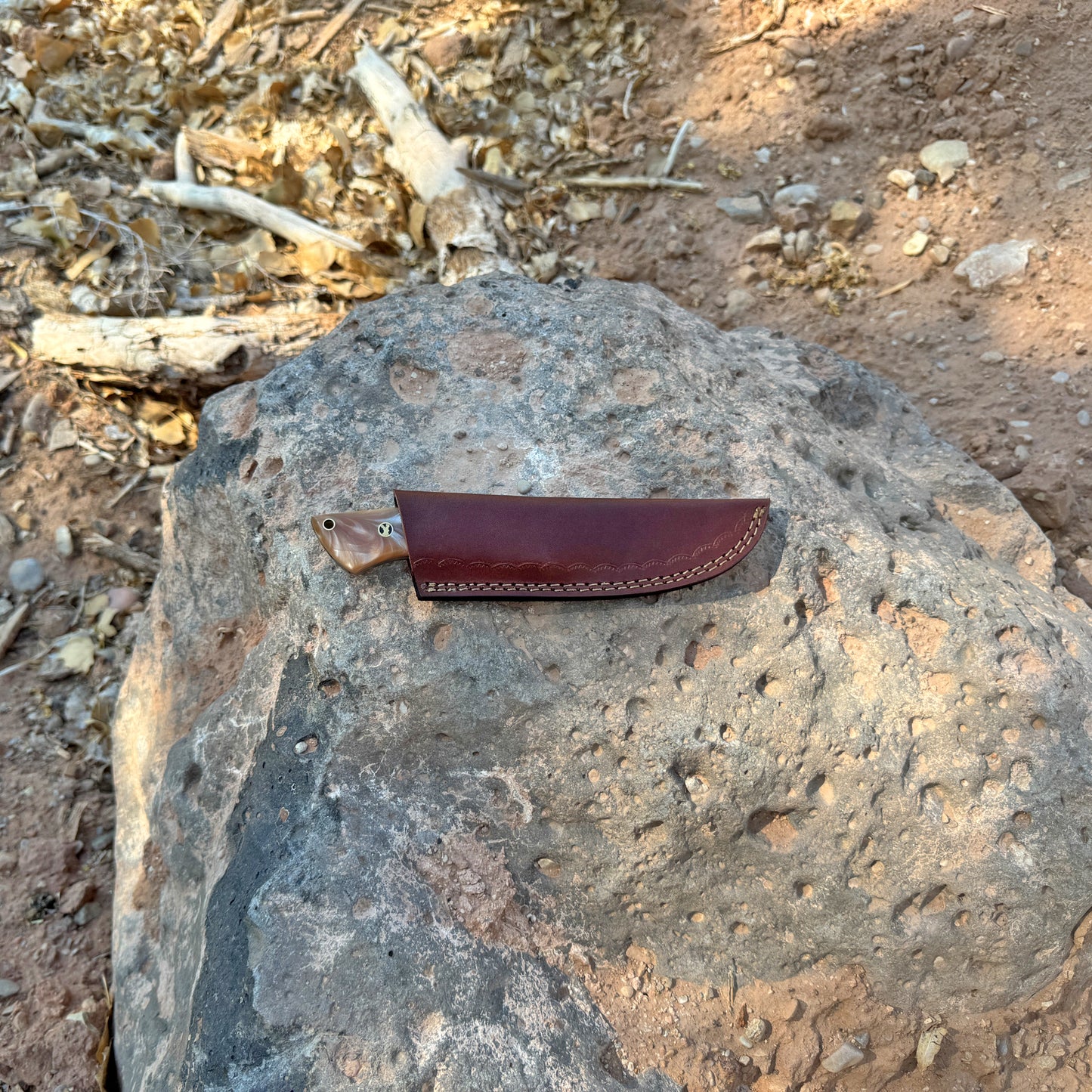 The Ember Wasp Hand-Forged Damascus Skinning Knife with Resin Handle