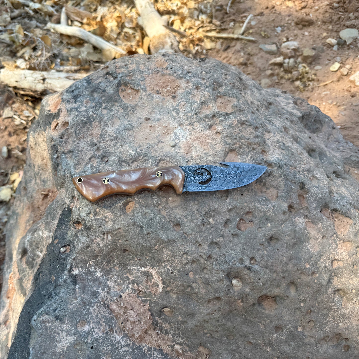 The Ember Wasp Hand-Forged Damascus Skinning Knife with Resin Handle