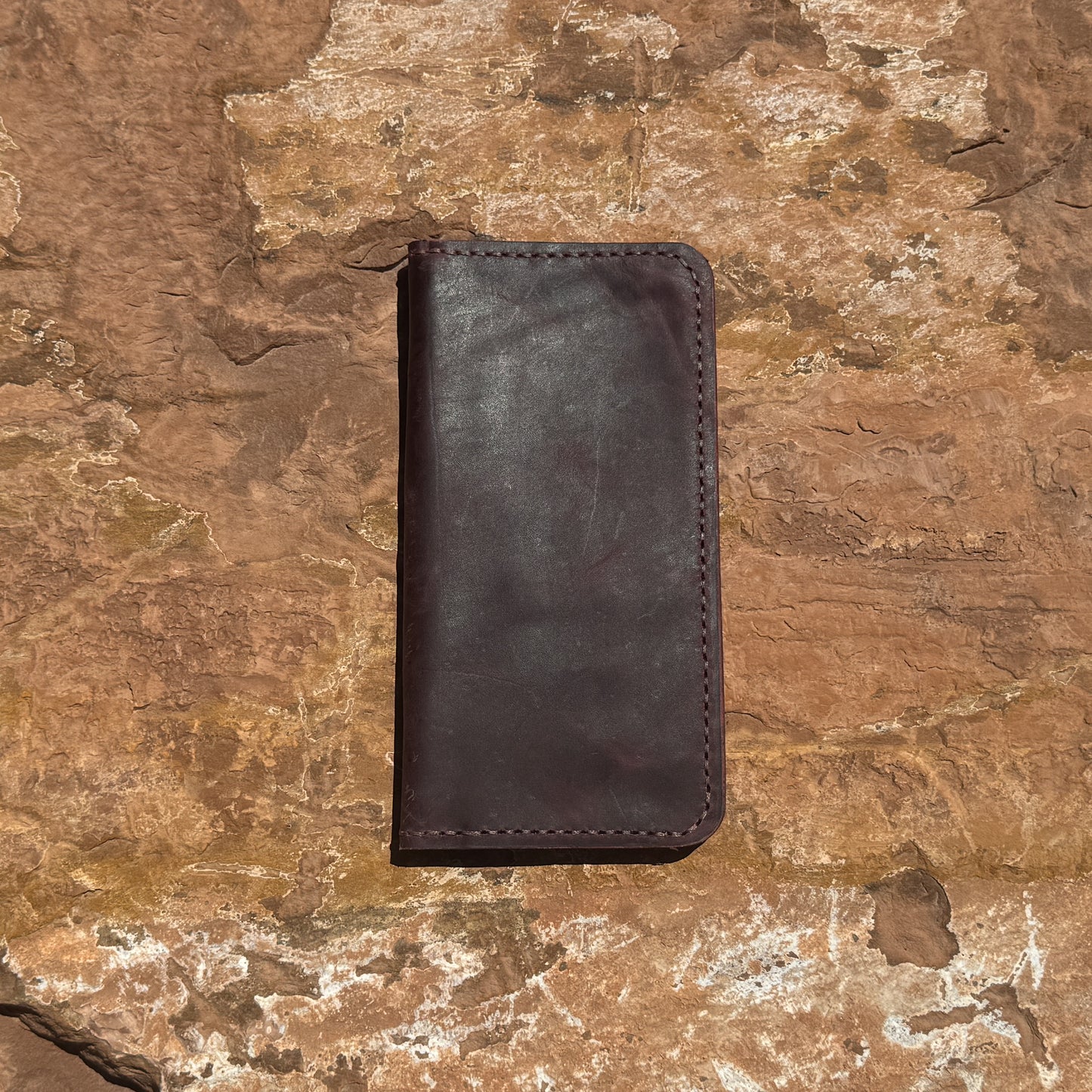 The Frontier Ledger Hand-Stitched Full-Grain Leather Bifold Wallet in Rich Mahogany