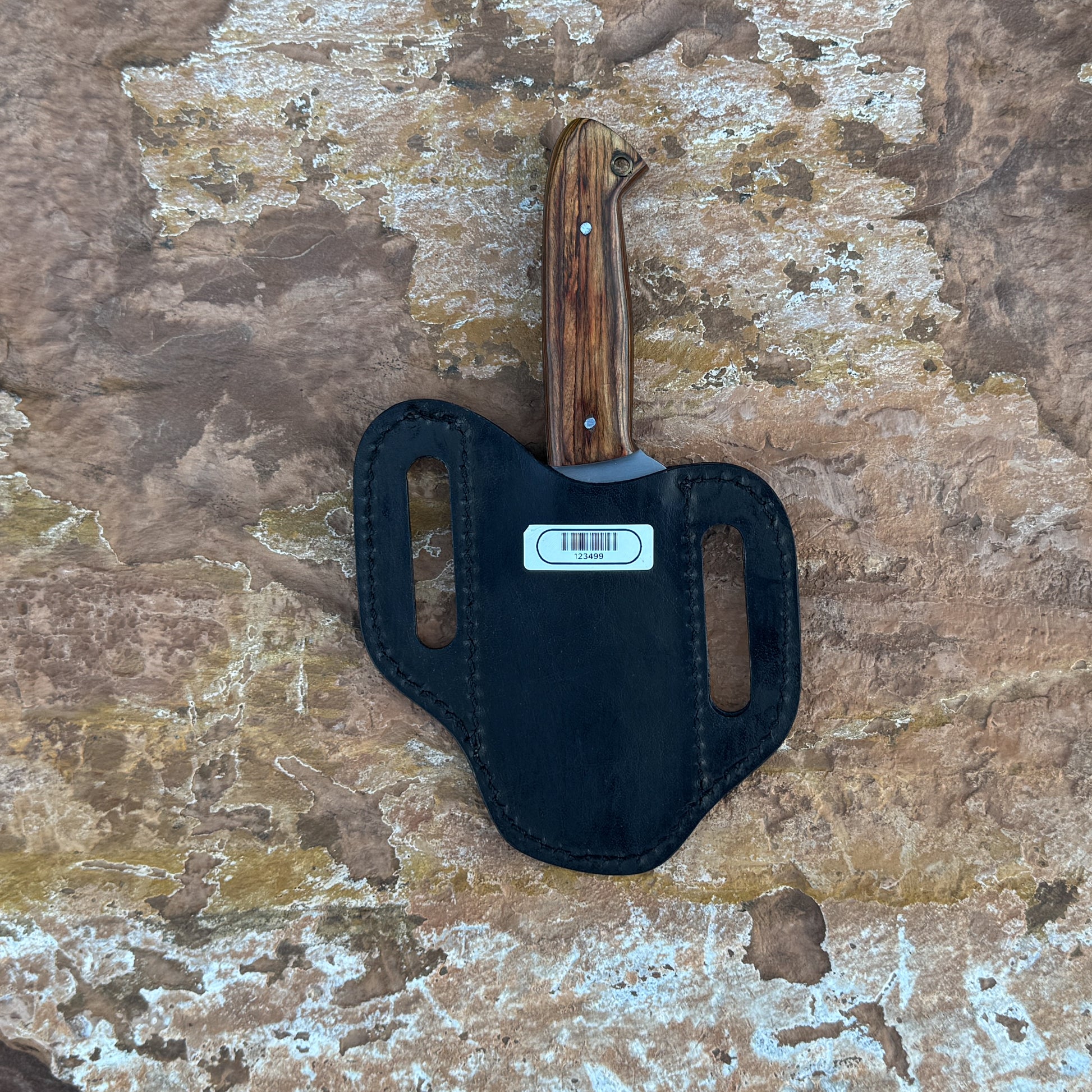 Sandridge stainless fixed blade knife with wood handle

Outdoor knife displayed on brown leather sheath

Natural wood handle with rich grain detail close-up

Stainless blade on rustic wood background

Sandridge knife and hand-stitched sheath arranged together

Fixed blade outdoor knife in natural lighting

Blue Spade Forge Sandridge held in hand for scale

Rugged field knife ready for trail and everyday tasks