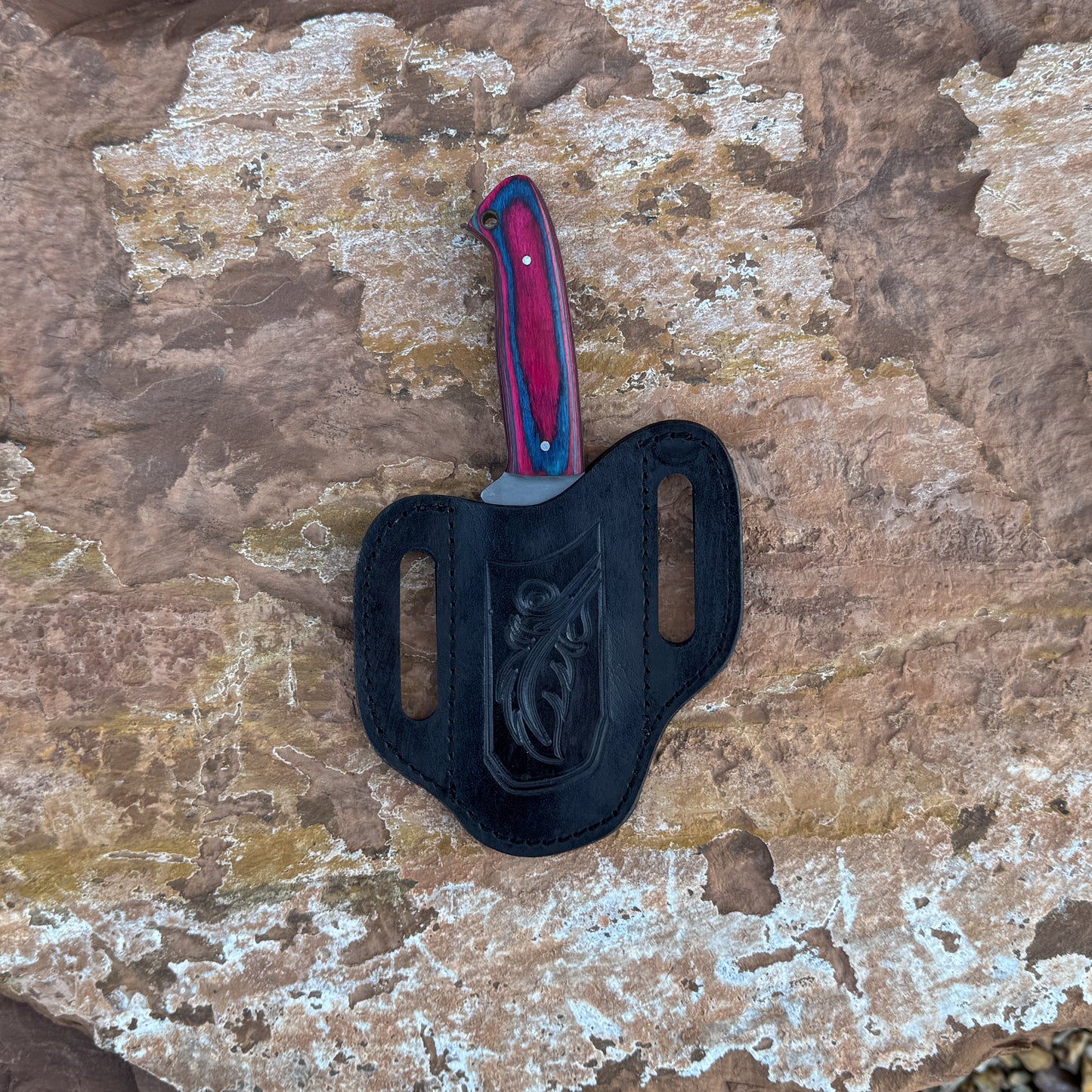 Woodsman Trail full-tang drop point knife on leather sheath

Hand-forged outdoor knife with hardwood handle

Full-tang fixed blade knife for camping and hunting

Blue Spade Forge Woodsman Trail knife in natural lighting

Leather sheath and handcrafted field knife displayed on wood

Close-up of drop-point blade edge on Woodsman Trail knife

Rugged outdoor knife with contoured hardwood grip

Knife and sheath set arranged for product display