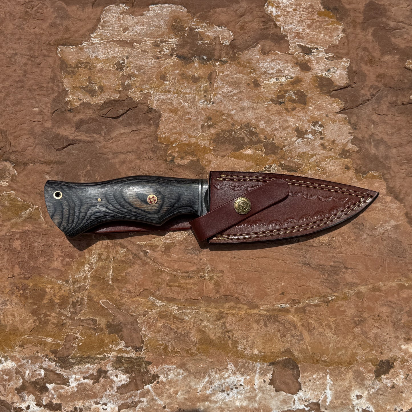 Backwood Hunter Scout Damascus drop-point hunting knife with premium hand-stitched leather belt sheath