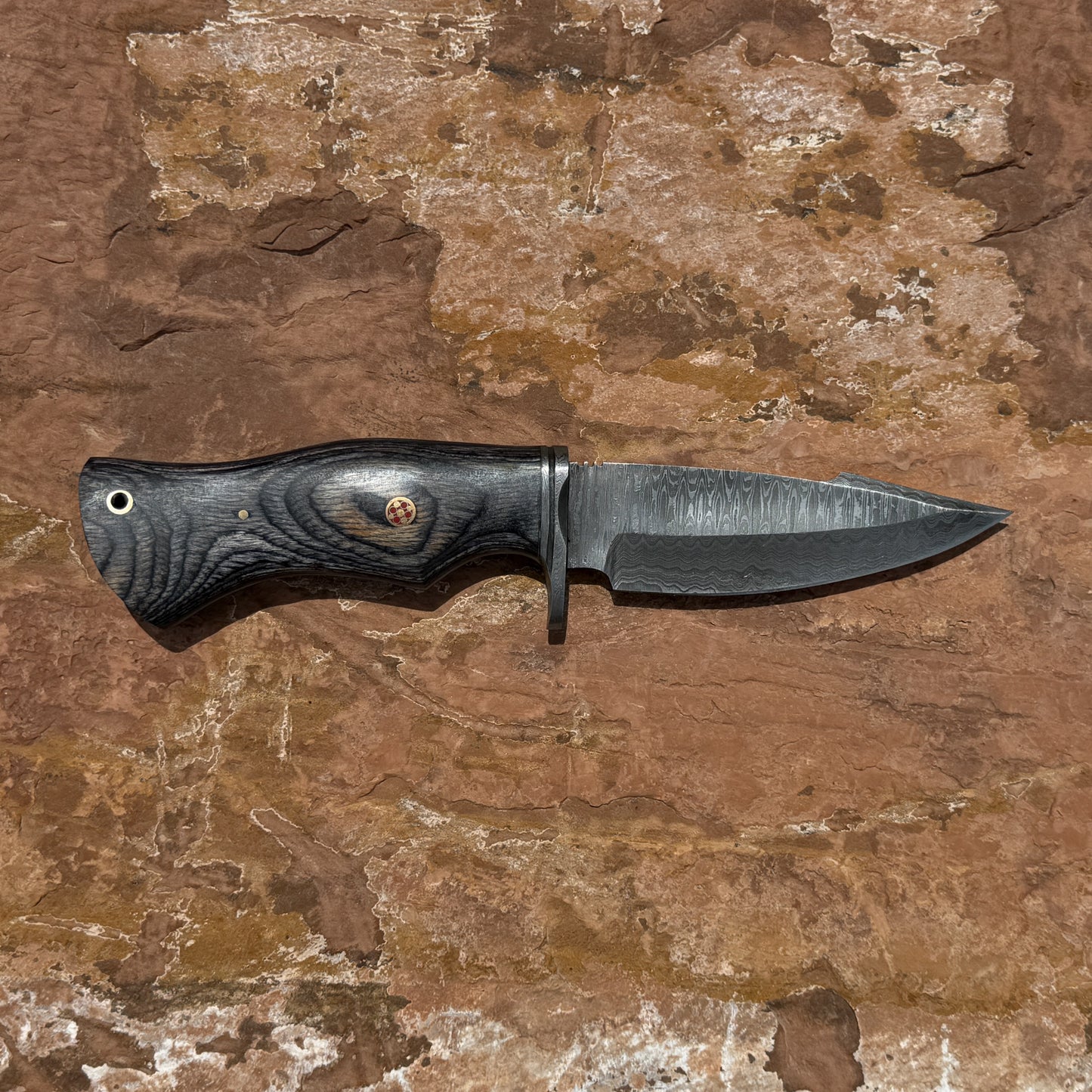Backwood Hunter Scout hand-forged Damascus hunting knife with contoured black hardwood handle