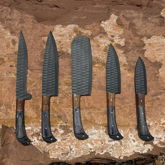 Black Summit Chef Set featuring five hand-forged high carbon steel kitchen knives with black forged finish and premium hardwood handles