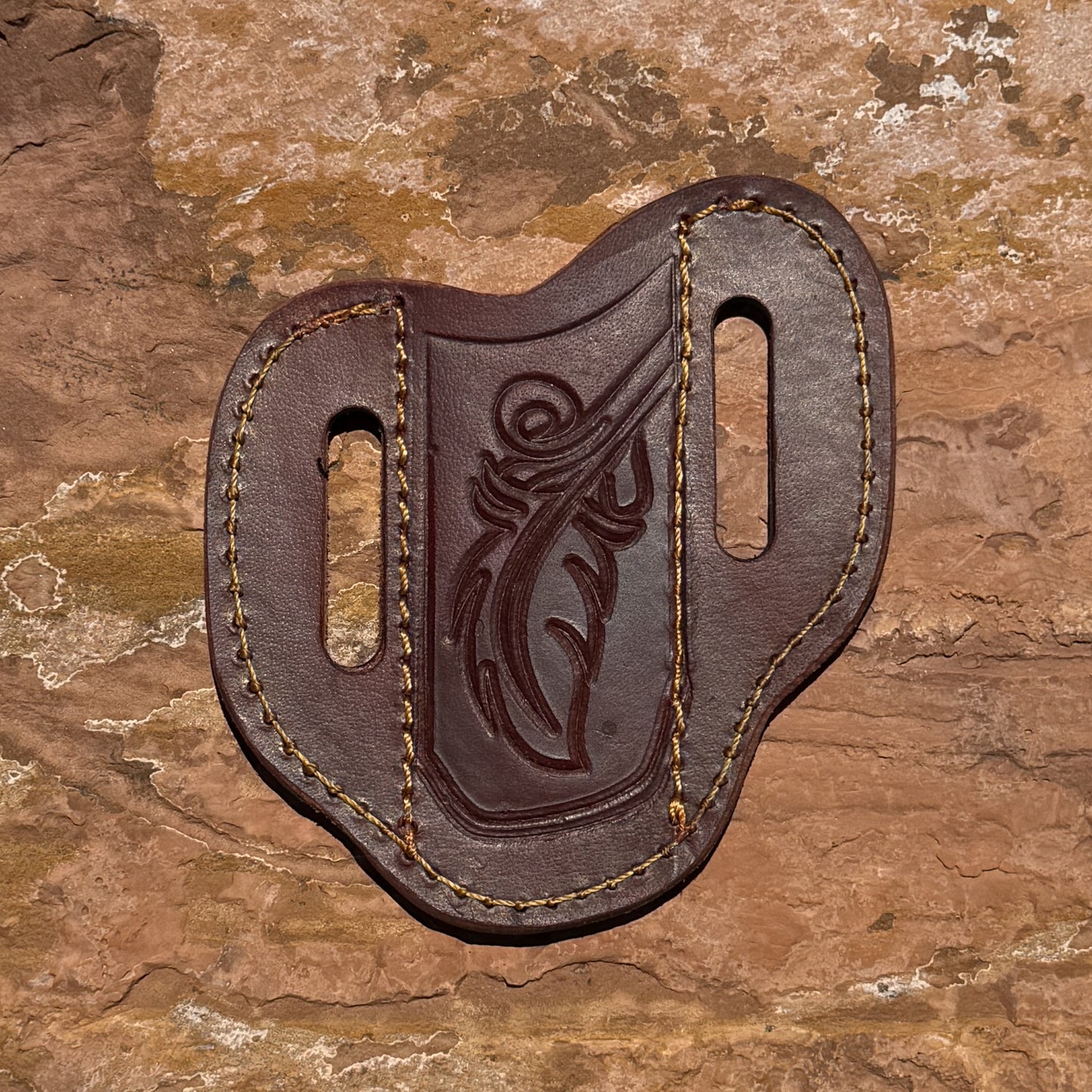Blue Spade Forge medium brown leather pancake knife sheath with hand-tooled design and heavy-duty stitching for fixed blade hunting, bushcraft, and everyday carry knives.