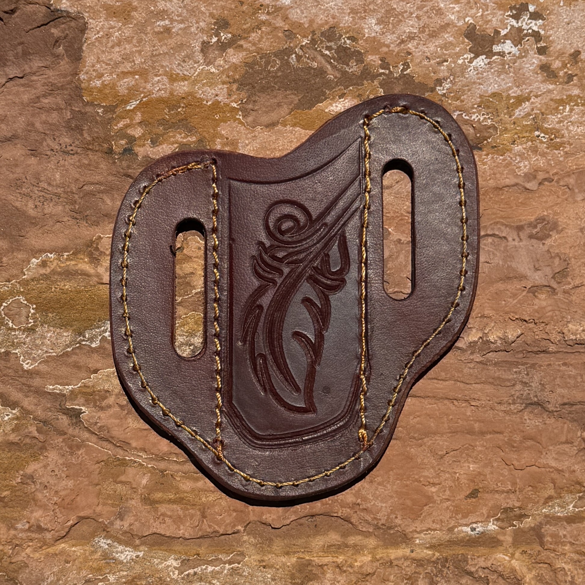 Blue Spade Forge medium brown leather pancake knife sheath with hand-tooled design and heavy-duty stitching for fixed blade hunting, bushcraft, and everyday carry knives.