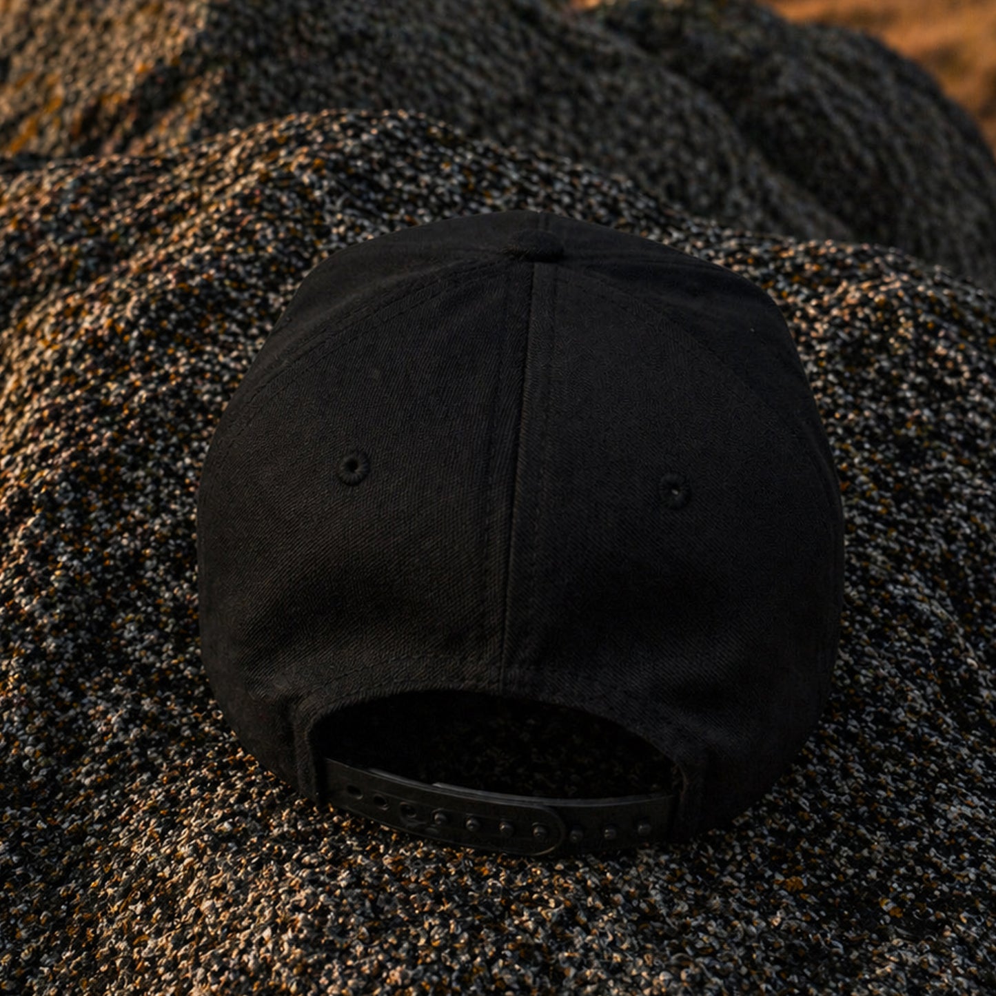 Black snapback hat rear view showing adjustable closure on Richardson 323FPC cap by Blue Spade Forge
